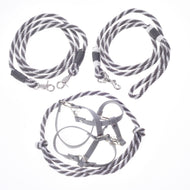 Three gray and white striped accessories from Hobby Horse LarDen’s Set Start Silver—including a halter, cordeo, lead rope, and reins—are arranged on a white background. Perfect as a matching harness and leashes or reins for your favorite hobby horse accessories.