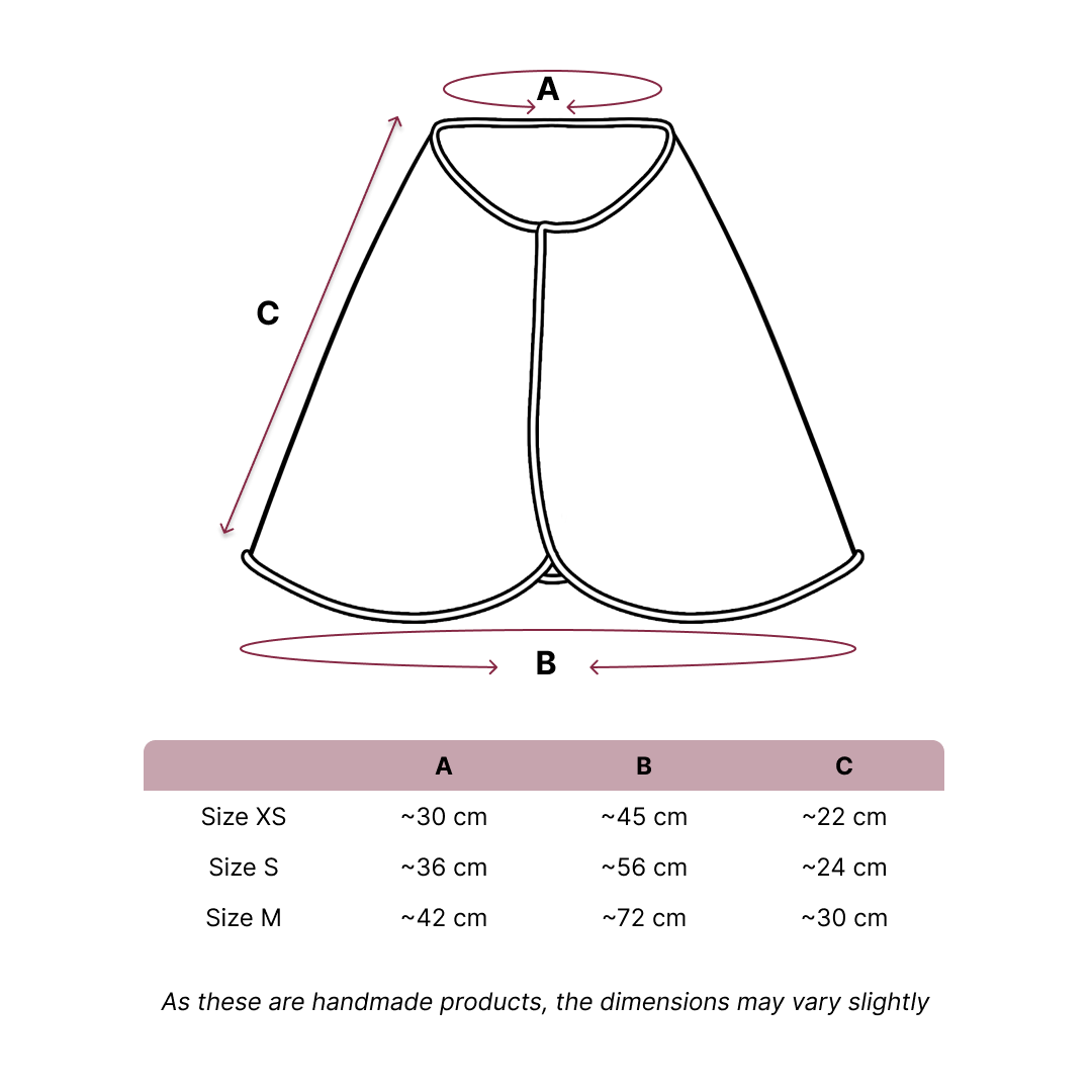 Line drawing of a cape for Hobby Horsing with labeled measurements A (neck), B (bottom width), and C (length). A table below lists sizes XS, S, and M, plus a note about slight handmade variation. Perfect for your Hobby Horse adventures!.