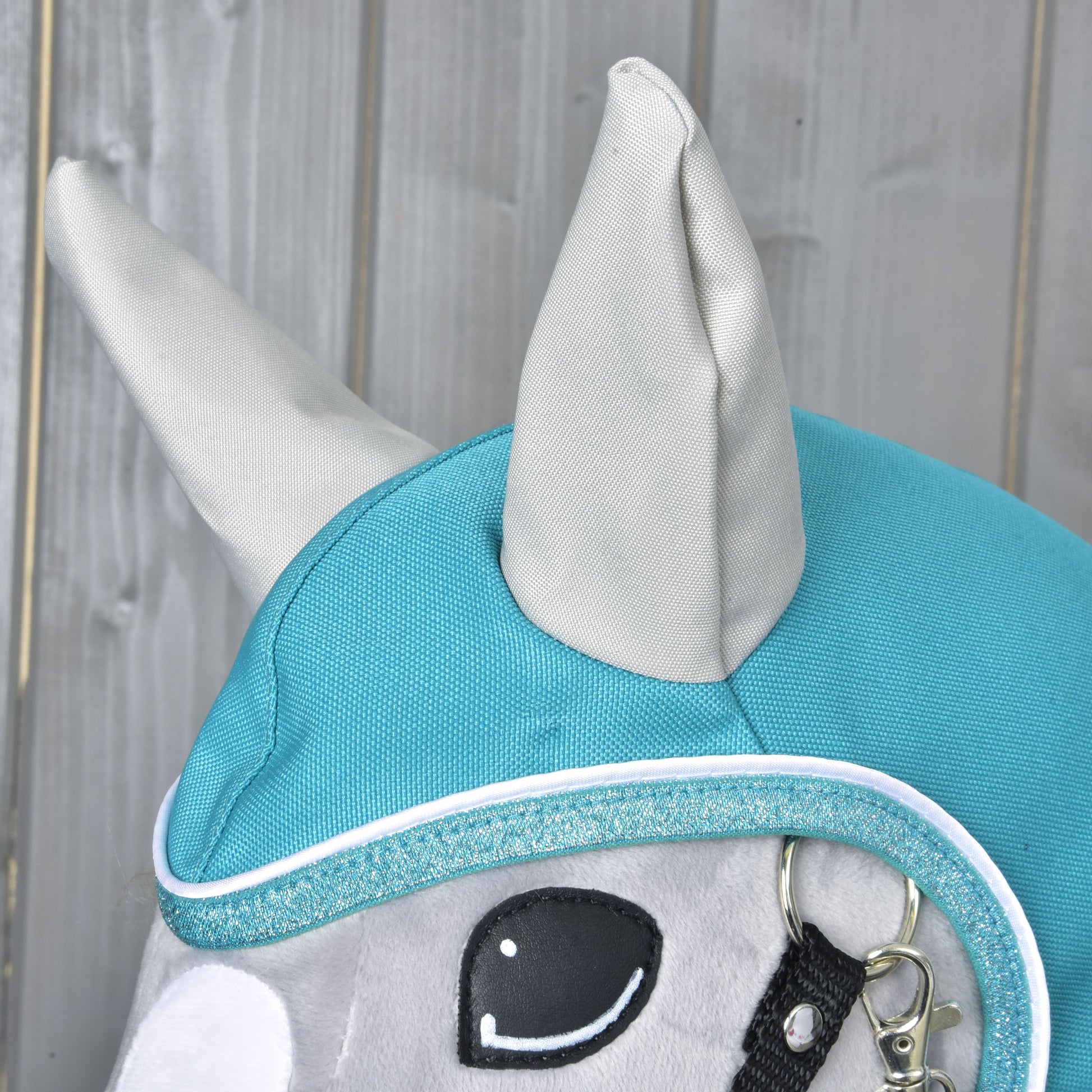 Imperméable turquoise